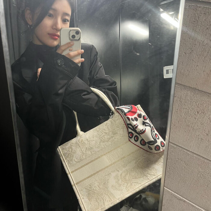 Suzy outfit from Feb 26, 2022 : Dior x Sacai jacket and more
