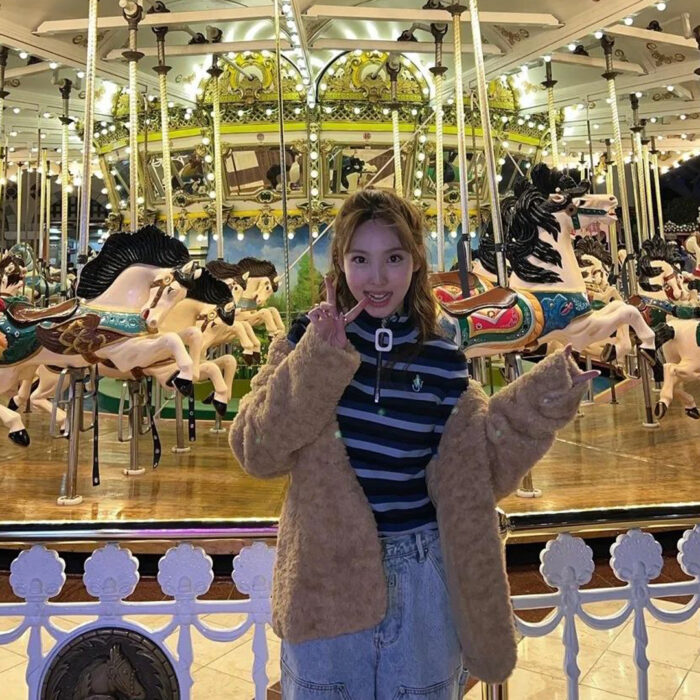Twice Nayeon dropped photos wearing TheOpen Product fur jacket on Instagram